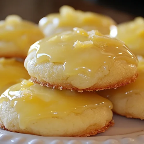Zesty italian lemon drop cookies on a plate