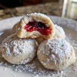Raspberry-Filled Almond Snowball Cookies
