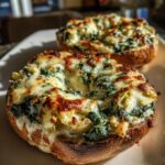 Cheesy Spinach-Artichoke Bagels